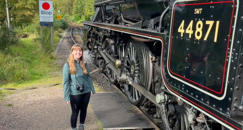 Melanie from the Absolute Escapes team with Jacobite Steam Train at Glenfinnan