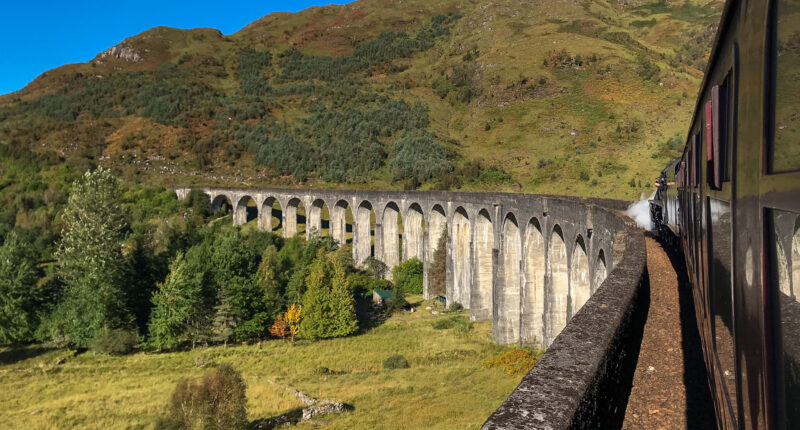 Jacobite Steam Train crossing the Glenfinnan Viaduct