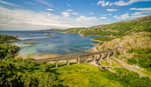 The West Highland Line passing by Loch Nan Uamh