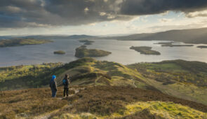 Walkers taking in the view of Loch Lomond from Conic Hill