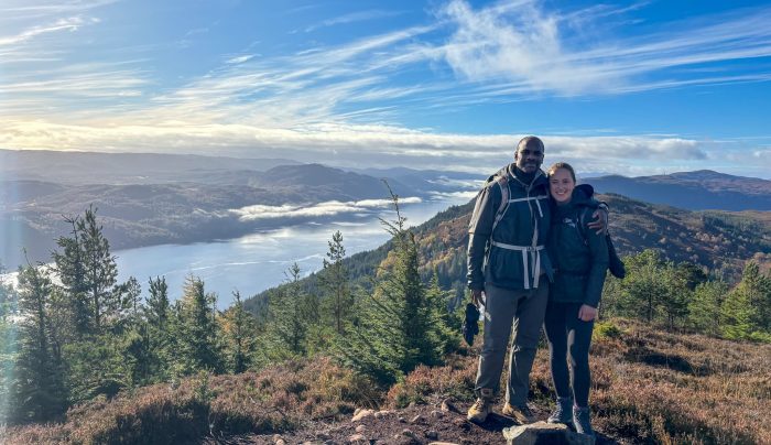 Absolute Escapes clients at a Great Glen Way viewpoint on the high route between Invermoriston and Drumnadrochit