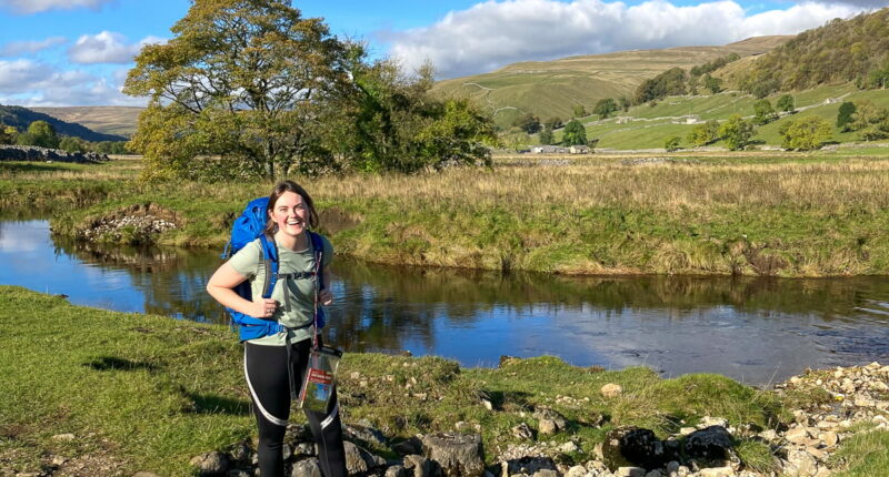 Laura from the Absolute Escapes team walking from Grassington to Buckden