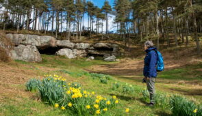 Our client, Anne, at St Cuthbert's Cave (credit - Peter Backhouse)