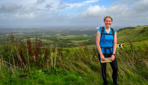 Charlotte from Absolute Escapes walking the South Downs Way