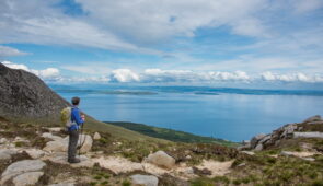 An Absolute Escapes client admiring the view of the Arran coast (credit - Peter Backhouse)