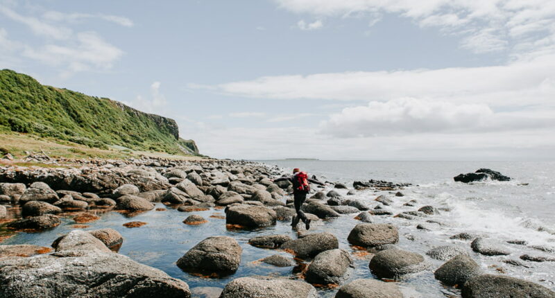 An Absolute Escapes client walking from Machrie to Kilmory (credit - Chrononauts Photography)