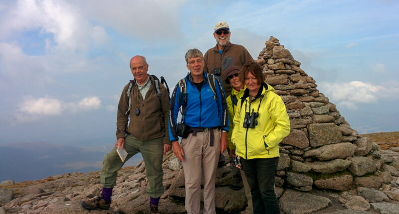 Absolute Escapes clients at the Cairn Gorm mountain summit (credit - Otto Meijer)