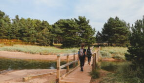 Absolute Escapes team members walking through Dunbar Country Park (credit - Zoe Kirkbride)