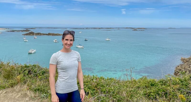 Katia from the Absolute Escapes team walking on Herm