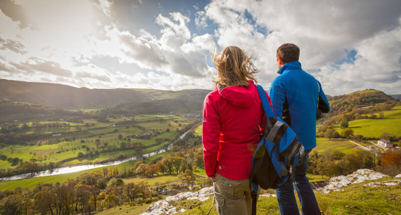 Walkers on Offa's Dyke Path overlooking Vale of Llangollen