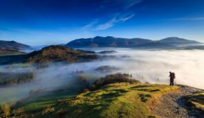 Fell walker ascending Catbells, The Lake District, Cumbria, England (credit - Michael Conrad)