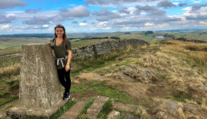 Caitlin from Absolute Escapes on the Hadrina's Wall Path at Caw Gap