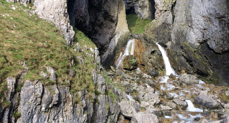 Hiker admiring Gordale Scar