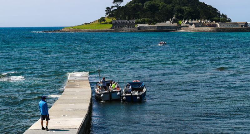 St Michael's Mount - a tidal island, home to a small community, medieval castle, and sub-tropical gardens