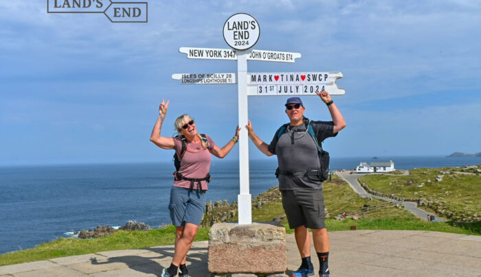Absolute Escapes clients at Land's End, mainland Britain's most south-westerly point
