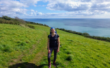 Megan from Absolute Escapes walking towards Rame Head