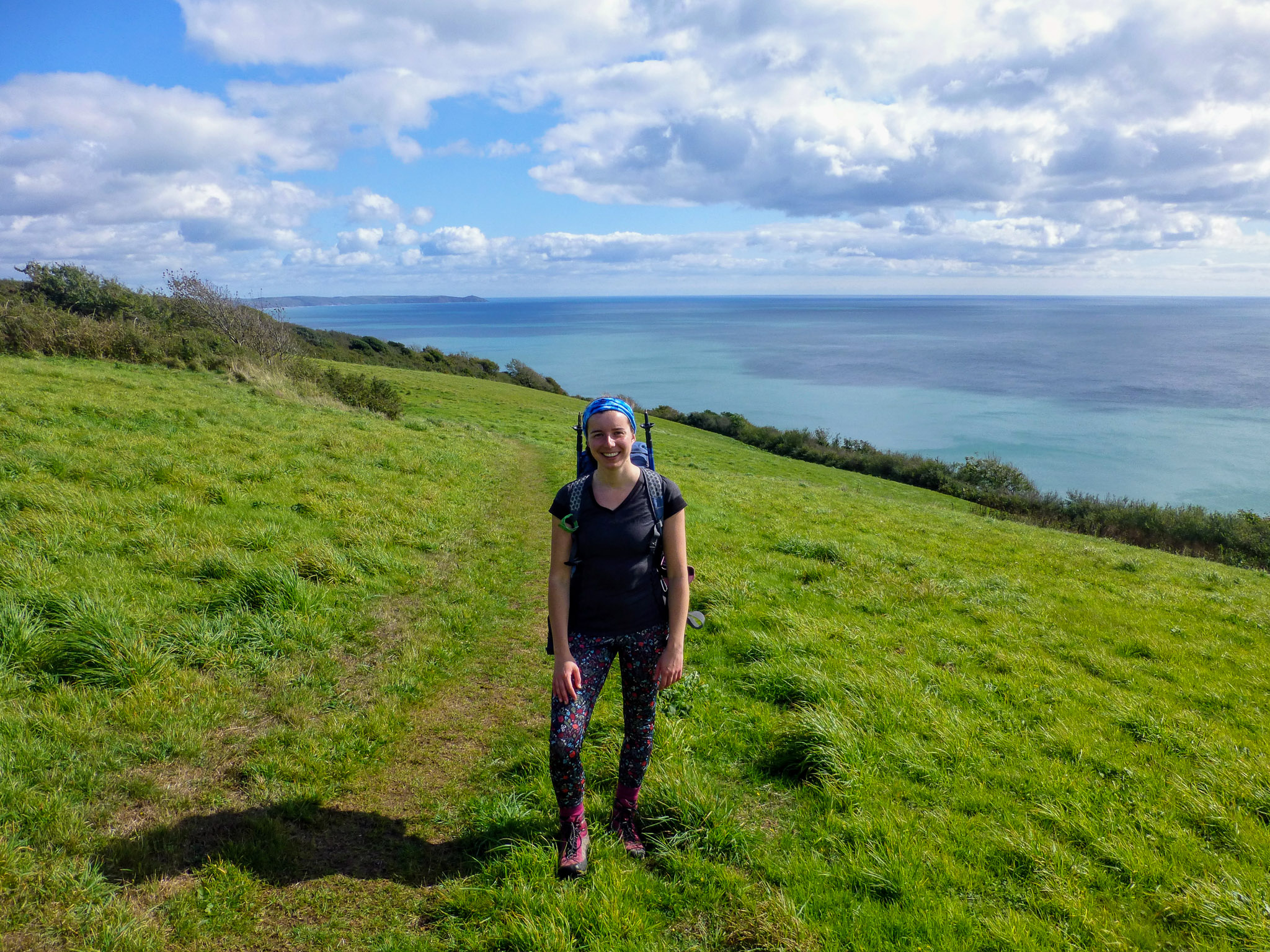 Megan from Absolute Escapes walking towards Rame Head