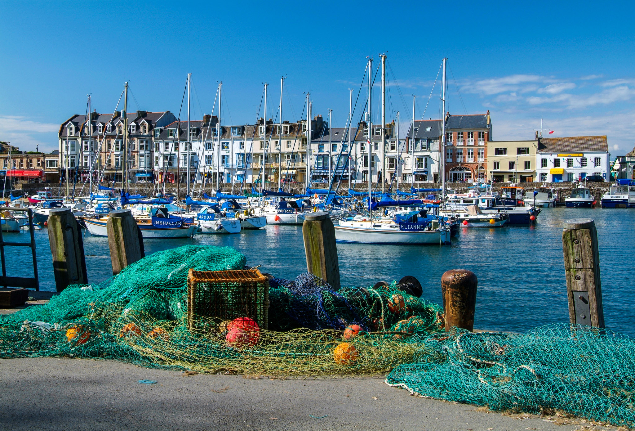 Moored yachts and sailing boats in the harbour of Ilfracombe, Devon