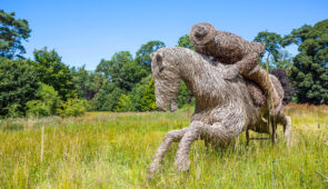 Wicker statue of Tam O' Shanter in the gardens of the Burns Cottage, Alloway