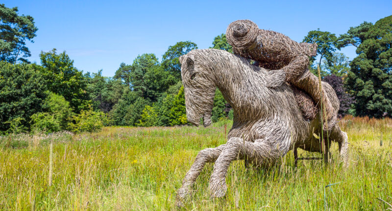 Wicker statue of Tam O' Shanter in the gardens of the Burns Cottage, Alloway