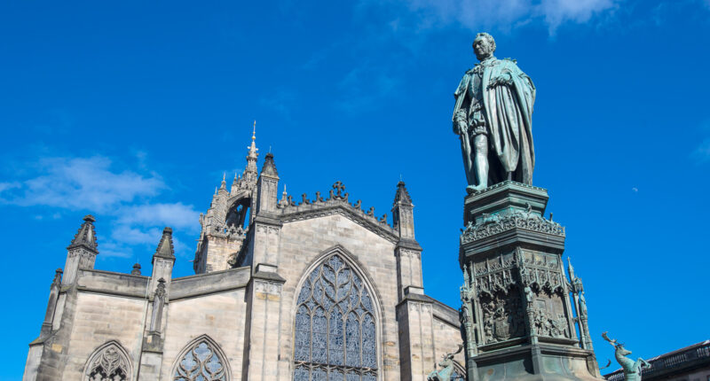 St Giles' Cathedral and Adam Smith statue on the Royal Mile, Edinburgh