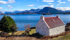 A remote cottage above Loch Shieldaig, looking towards the mountains of Torridon (credit - Katie Rogen from the Absolute Escapes team)