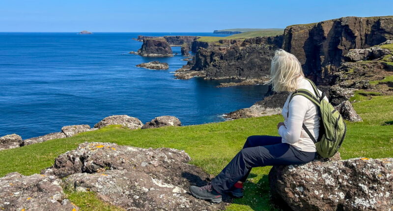 Our client enjoying the views at Esha Ness, Shetland (credit - Poul Møller)
