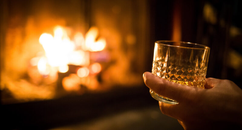 Single malt whisky by the cosy fire