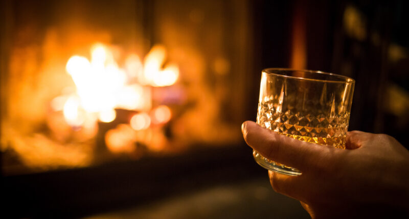 Single malt whisky by the cosy fire