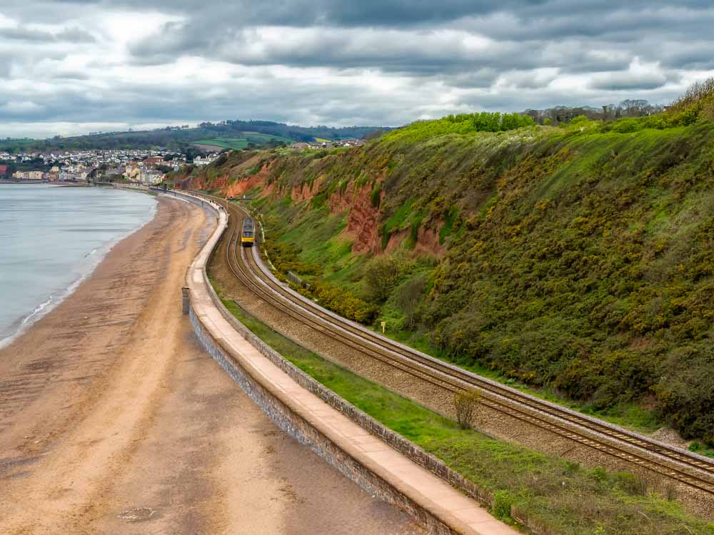 Walking-along-the-sea-wall-at-Dawlish