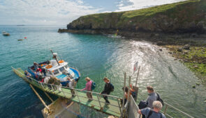 Group boarding Dale Princess boat at Martin's Haven, Skomer