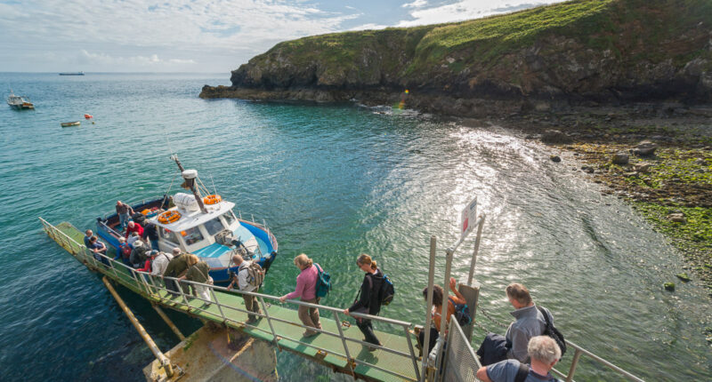 Group boarding Dale Princess boat at Martin's Haven, Skomer