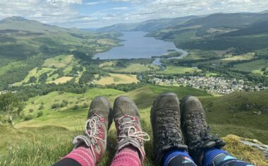 Hiking Boots overlooking the view of Killin in the Scottish Highlands. VisitBritain/Stacy Smith