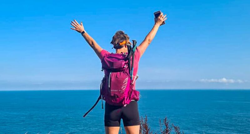 Hiker on north Devon coast