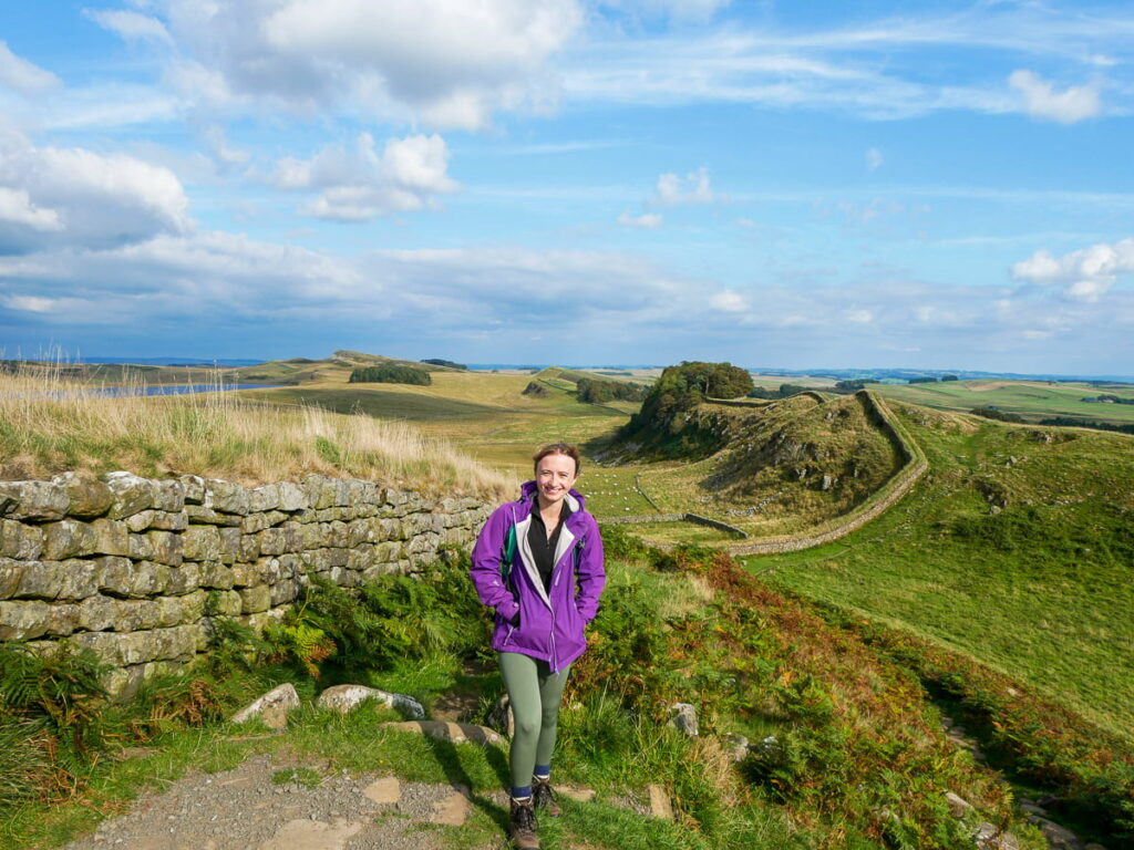 Daisy from the Absolute Escapes team walking Hadrian's Wall Path