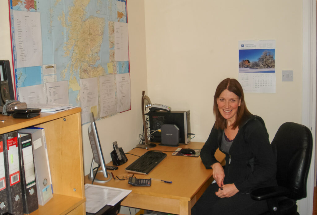 Sheila at her desk in the Maxwell Street office