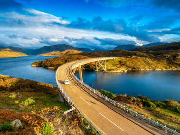 The Kylesku Bridge on a scenic Scotland road trip on the North Coast 500 route.