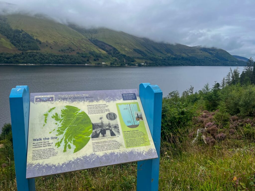 Great Glen Way trail map and information board with Loch Ness panoramic views in the Scottish Highlands