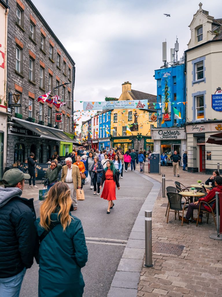 Galway streets - a hub of Irish culture with buskers, cafés, pubs, and independent shops. A must visit on a Wild Atlantic Way road trop.