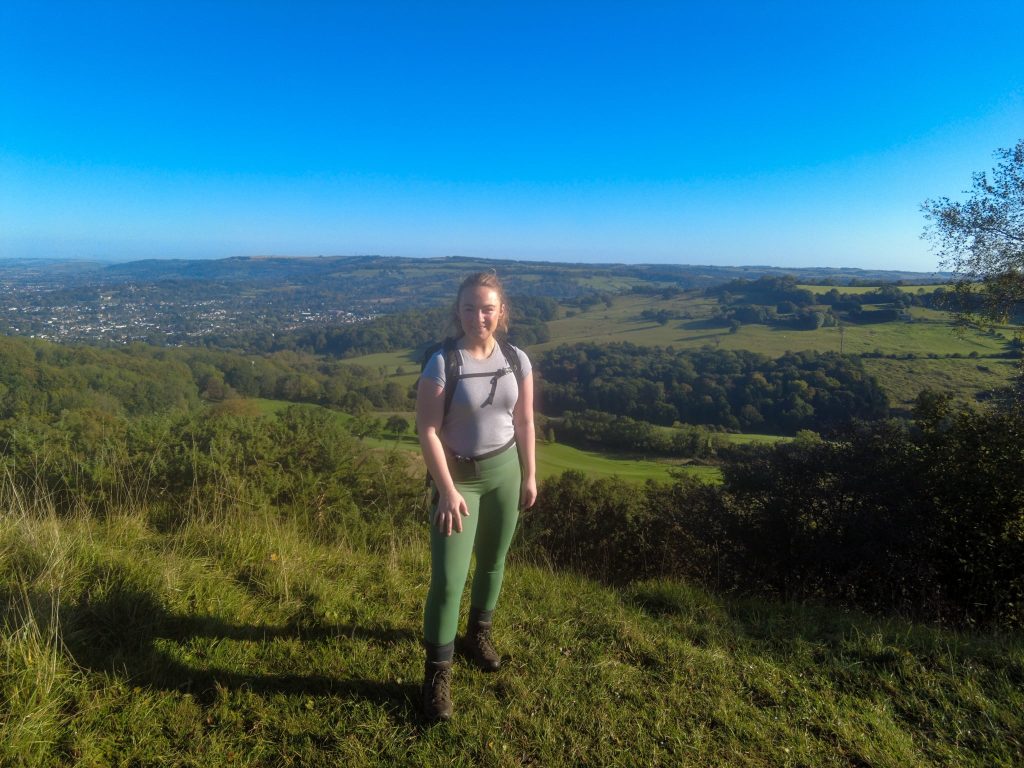 Kate walking up Leckhampton Hill on the Cotswold Way