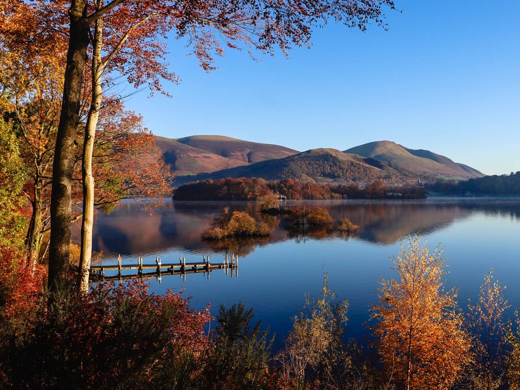 Autumn colours in the Lake District, England, ideal for travellers wondering where to go in the UK in October