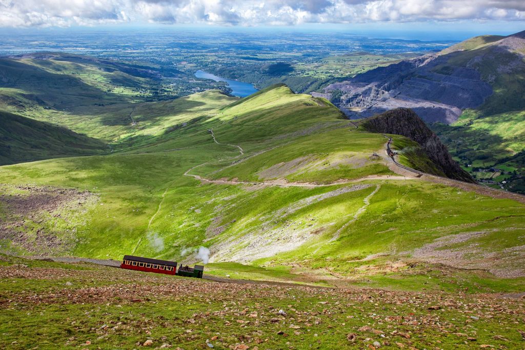 Mountain railway in Snowdonia National Park, Wales, during summer, a popular highlight when planning the best time to travel the UK