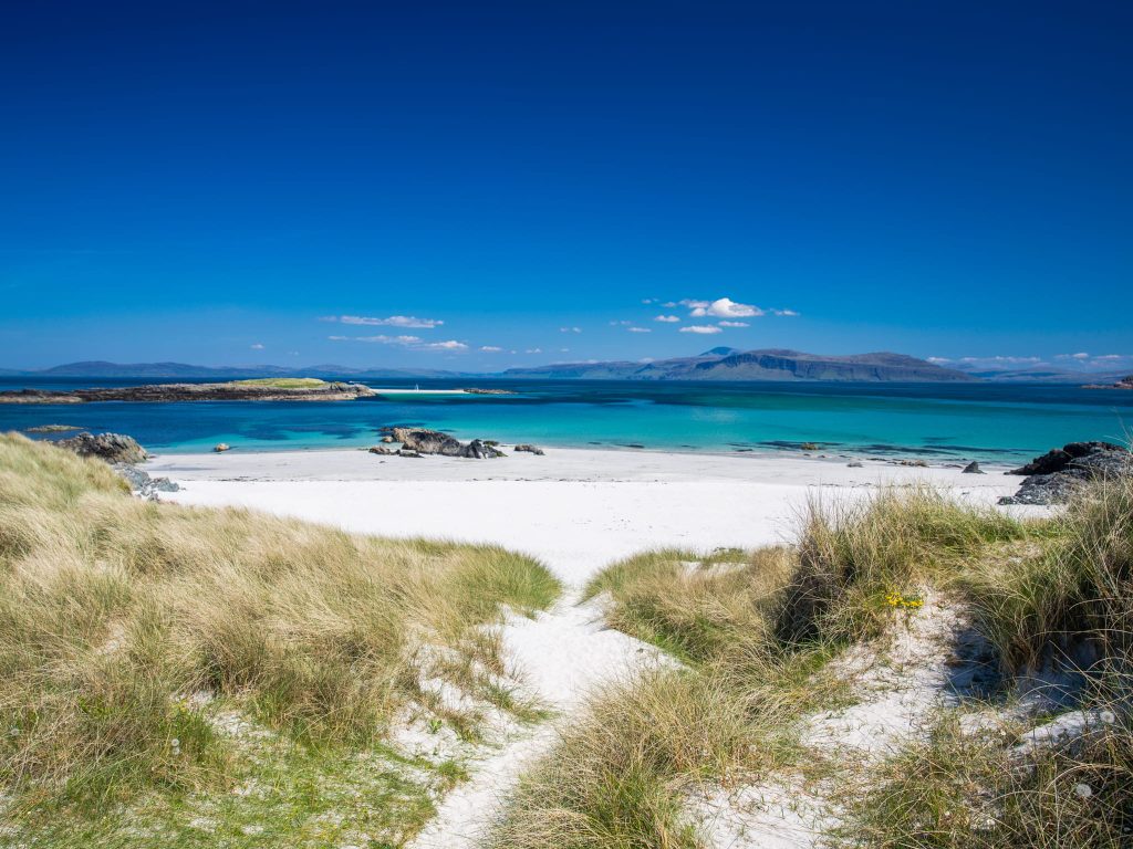 Sunny sand dunes on the Isle of Iona, Scotland - the Outer Hebrides is a beautiful and peaceful destination to visit in summer.